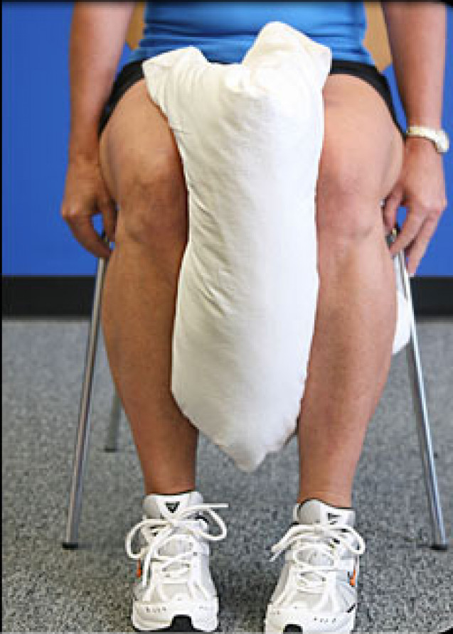 Seated pillow squeeze